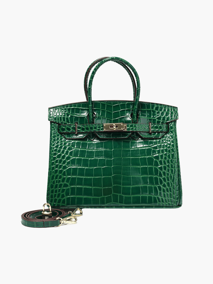 Premium women's leather handbag with a smooth texture and elegant metallic closure.