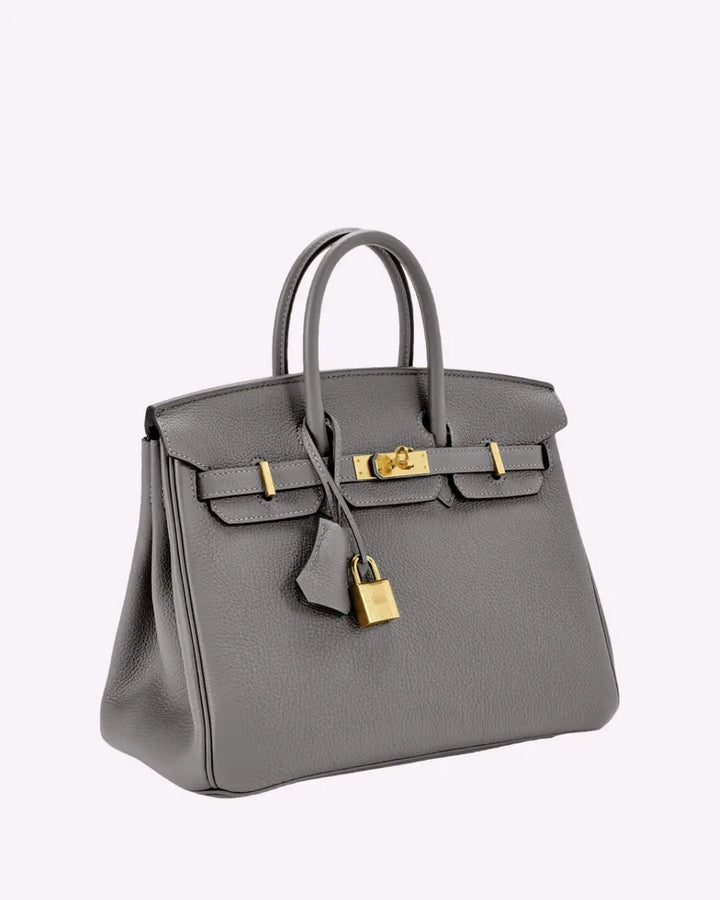 Stylish women's leather crossbody bag, an elegant fashion statement with a secure magnetic closure.