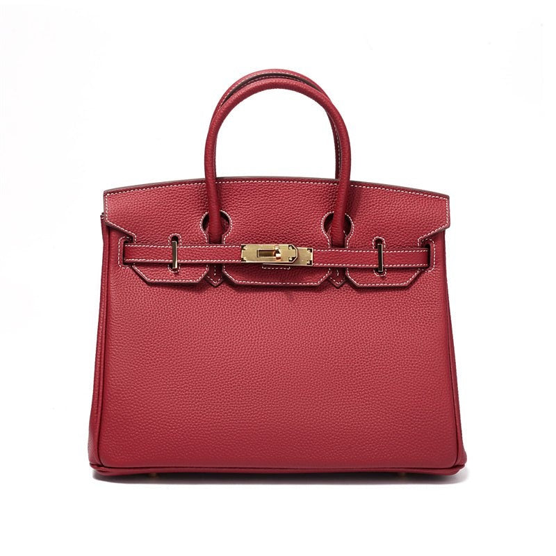 Elegant leather crossbody bag for women, offering a luxurious feel and practical compartments.