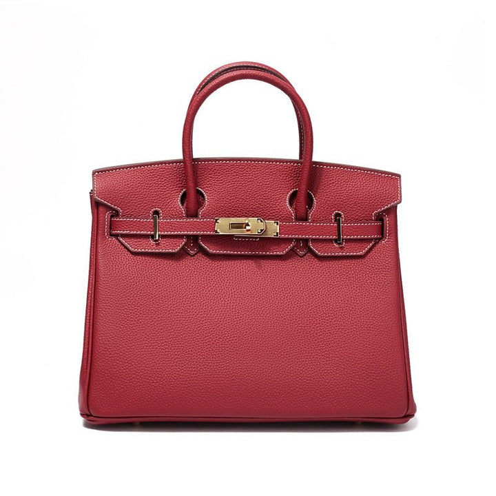 Elegant leather crossbody bag for women, offering a luxurious feel and practical compartments.