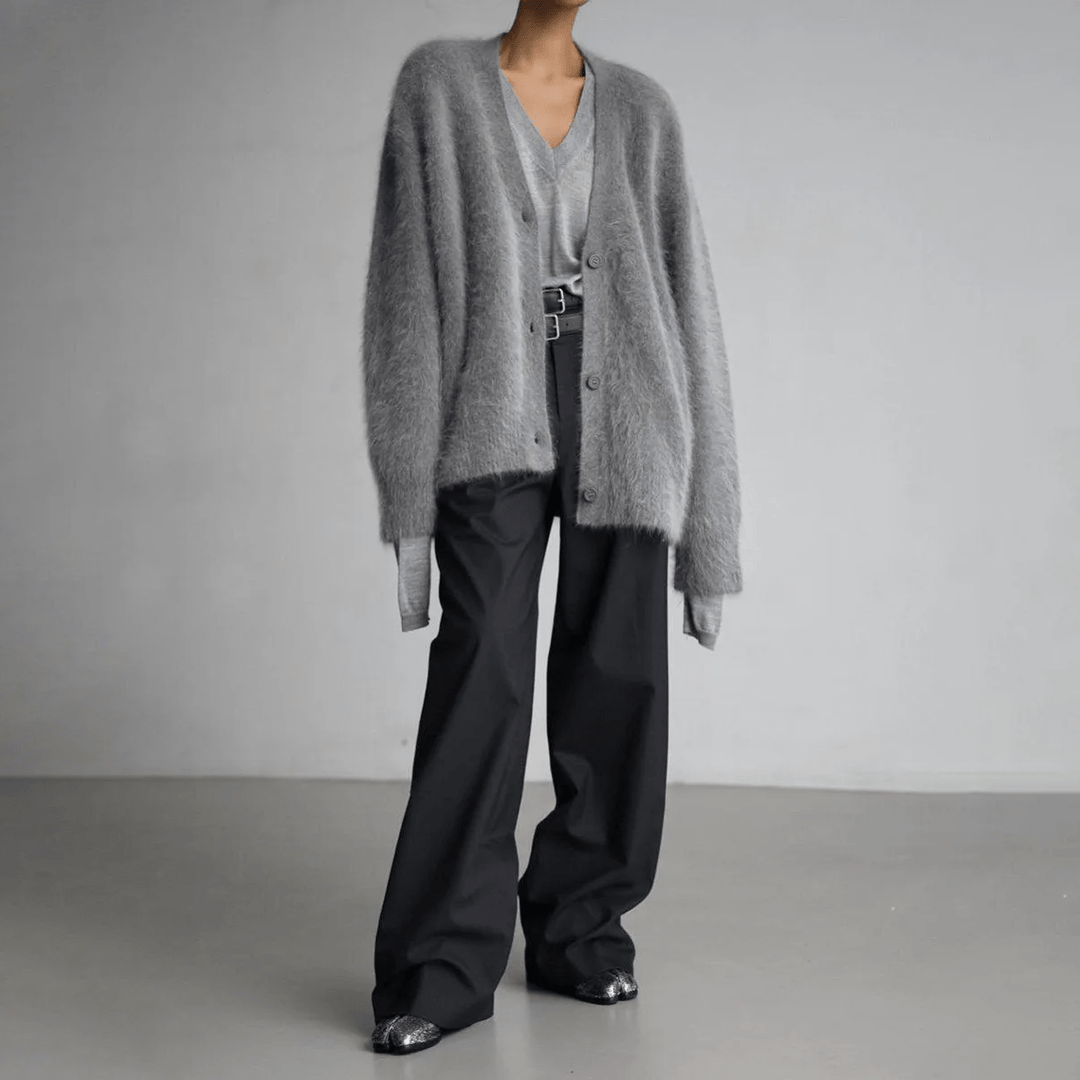 Elegant women's fluffy cardigan, designed for a relaxed fit and ultimate soft comfort. Winter style.