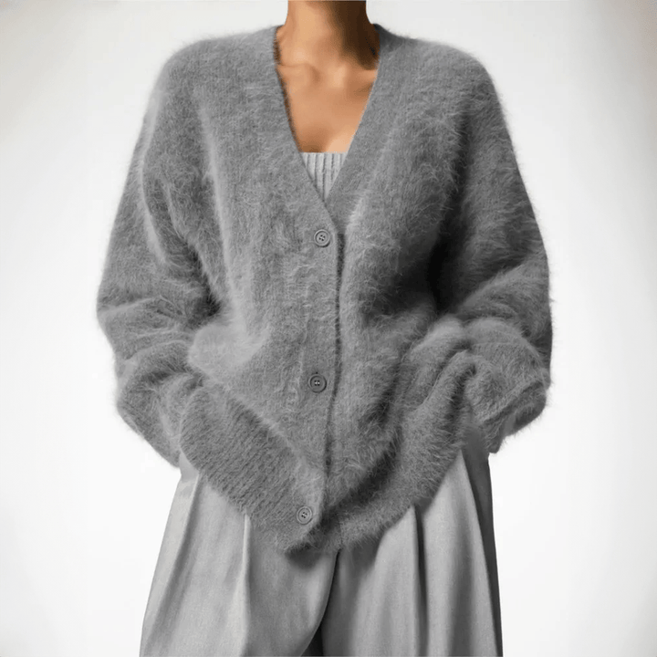 Stylish women's fluffy cardigan, a cozy sweater for effortless fashion and everyday warmth.