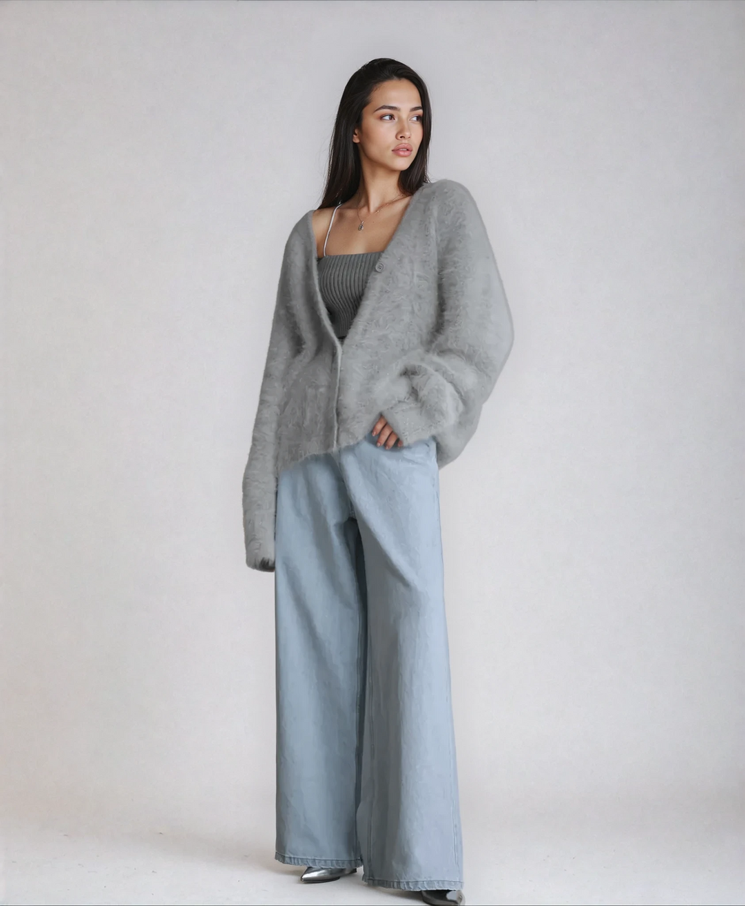Women's fluffy cardigan in a relaxed fit, offering effortless comfort and style for everyday wear.