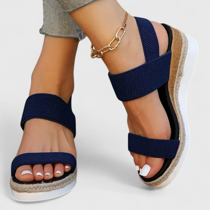 Health-focused women's sandals, orthopedic design, arch support, and a cushioned feel.