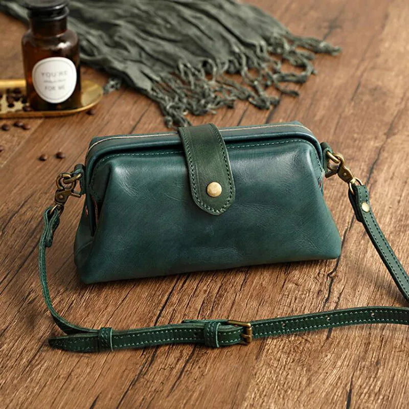 PU leather women's vintage shoulder bag. Doctor bag style handbag, a stylish and classic fashion accessory.