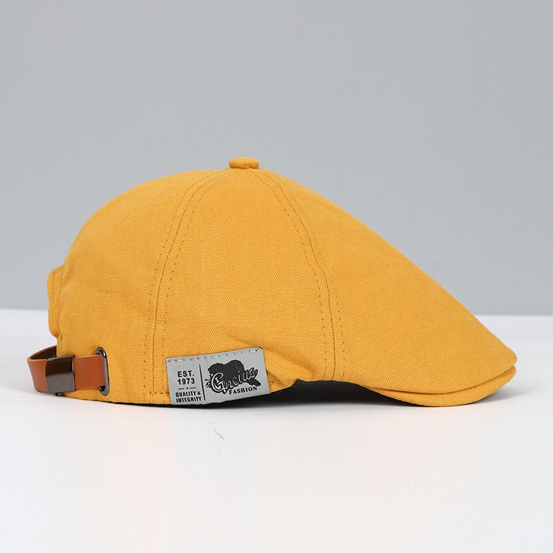 Close-up of the textured cotton fabric on a classic women's adjustable beret hat.