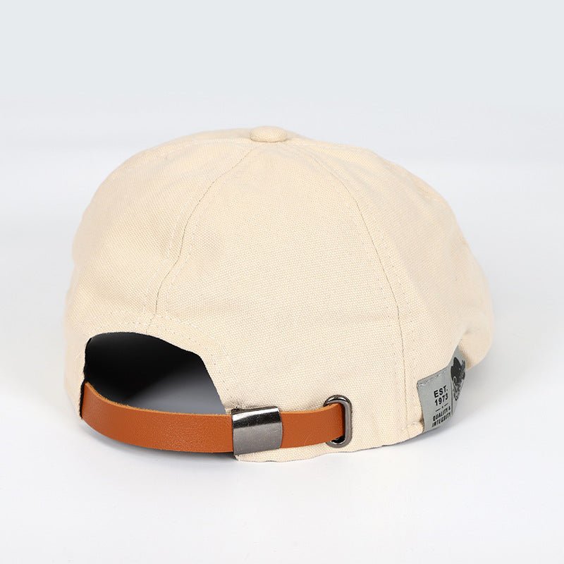 Versatile women's adjustable beret hat in a classic design, ideal cotton headwear accessory.