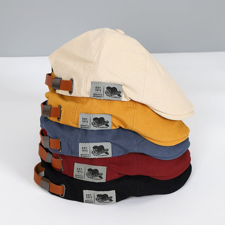 Model wearing a sophisticated women's adjustable cotton beret, showcasing its classic fashion appeal.