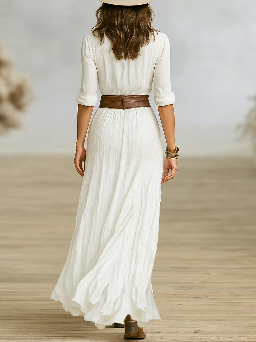 Elegant women's belted long dress, featuring a chic pleated lapel. Perfect versatile formal or evening wear.