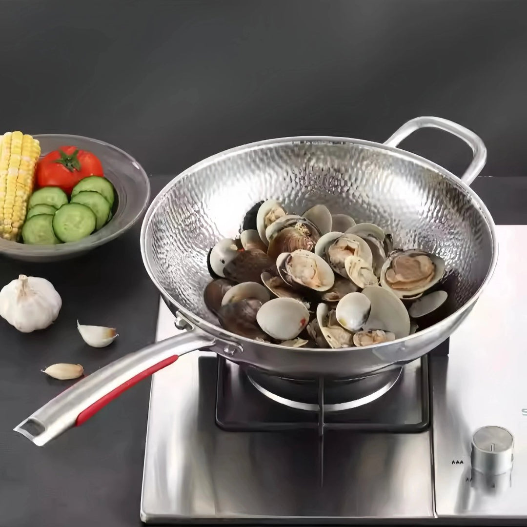 Premium titanium wok with a round bottom, perfect for induction cooktops. Ideal for stir-frying and healthy cooking.