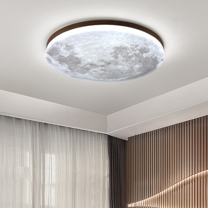 Contemporary moon LED ceiling lamp, providing bright, adjustable lighting. Perfect modern home decor for bedrooms & living rooms.