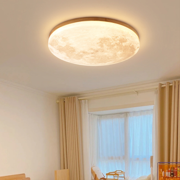 Elegant LED moon ceiling light, perfect for modern living rooms, bedrooms & dining areas. Stylish home decor lighting.
