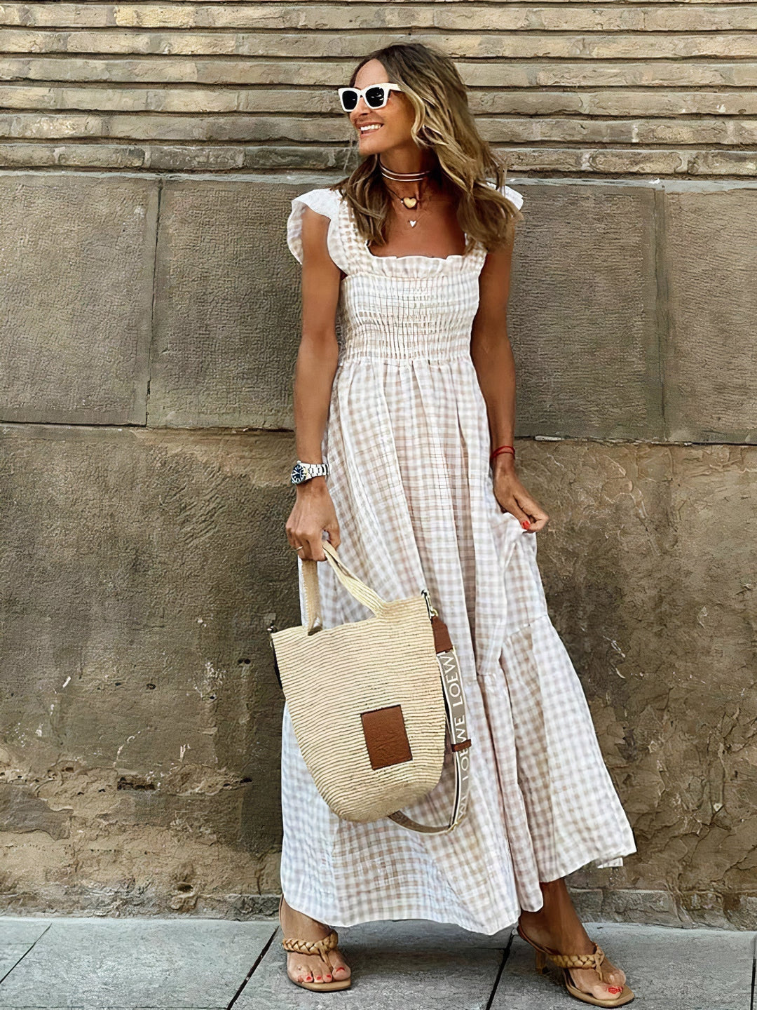 Chic women's long plaid summer dress. Effortlessly elegant, this classic check maxi dress offers a breezy, stylish look.