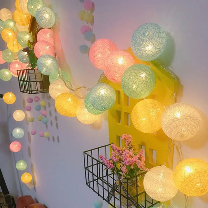 Cotton ball string lights as a backdrop, creating a magical setting for photos or events.