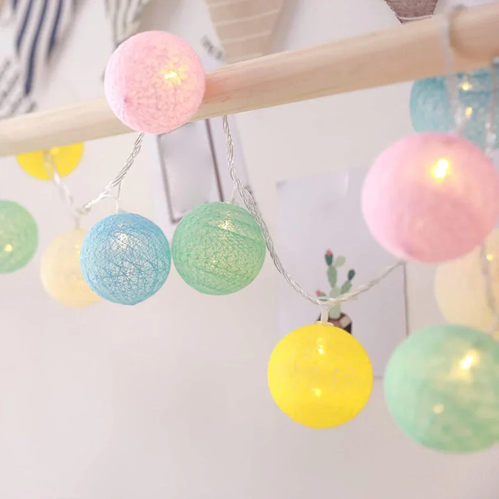 Holiday-themed cotton ball string lights, festive decor for a joyous celebration.
