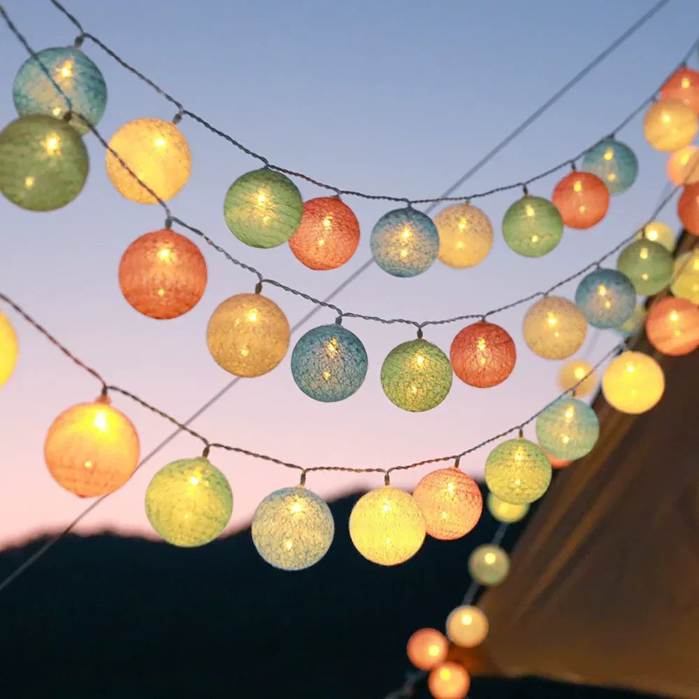 Artistic cotton ball garland, a decorative statement piece for unique home decor.