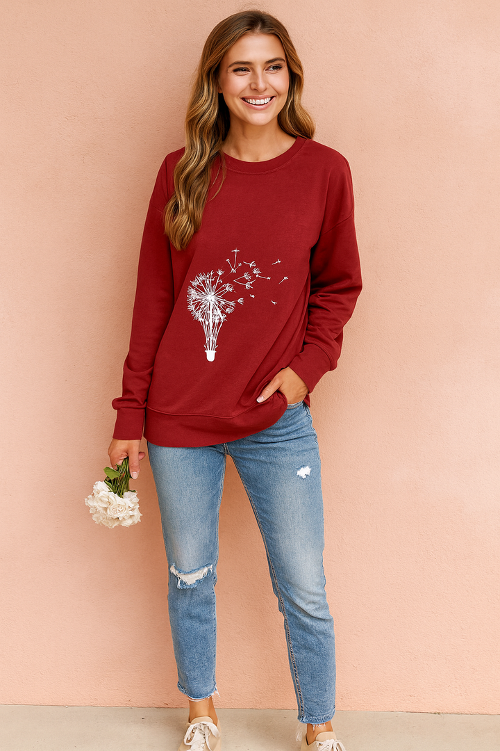 Stylish women's long-sleeve sweatshirt featuring a delicate dandelion print. Comfortable spring/fall fashion top for women.