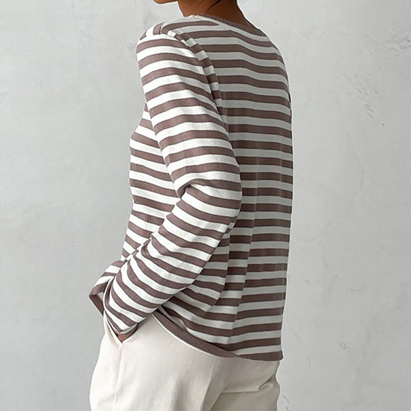 Winter warmth: Cozy women's striped knit sweater. Long sleeve crew neck pullover, a versatile knit essential.