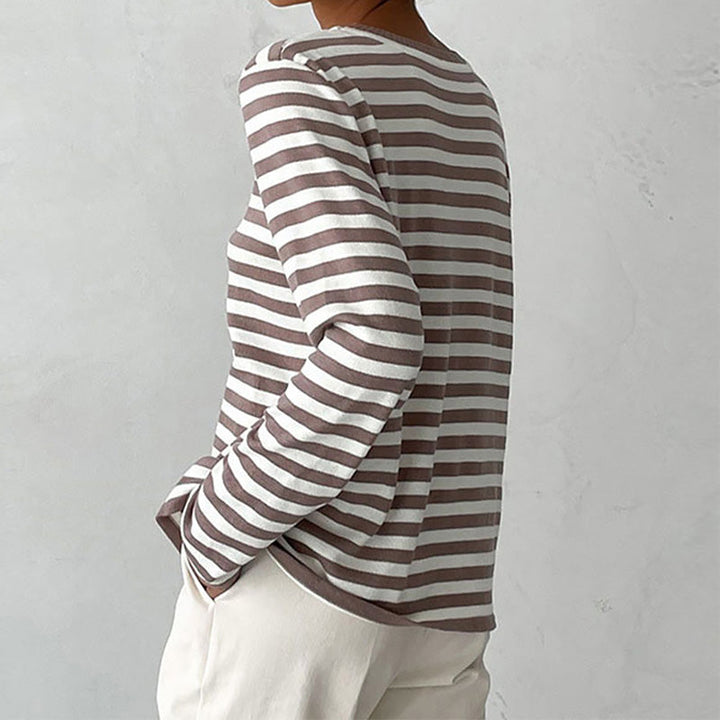 Winter warmth: Cozy women's striped knit sweater. Long sleeve crew neck pullover, a versatile knit essential.