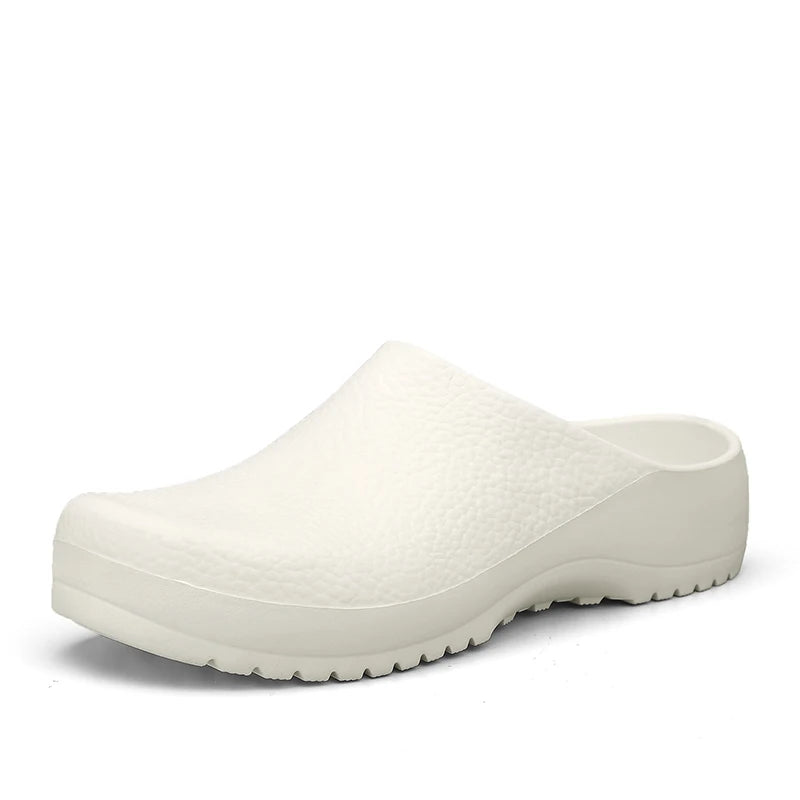 Black waterproof work clogs for kitchen staff. Non-slip, comfortable, easy-clean professional chef shoes.