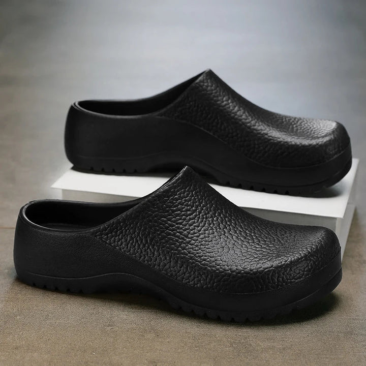 Durable unisex waterproof work clogs offering all-day comfort & non-slip safety. Professional footwear, easy to clean.