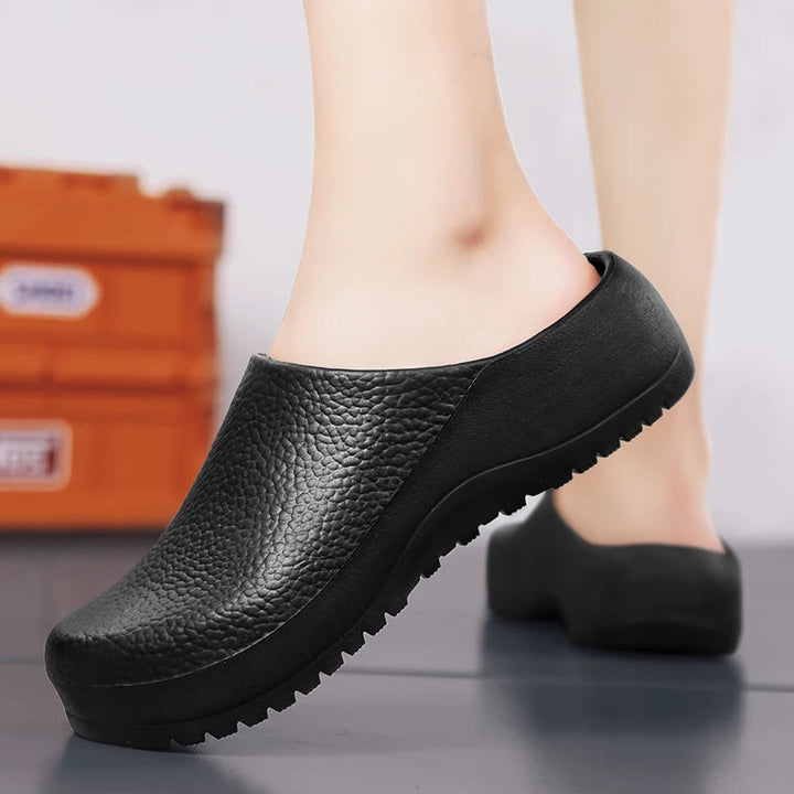 Ergonomic unisex waterproof work clogs with non-slip sole. Comfort & safety for healthcare, kitchen & salon pros.