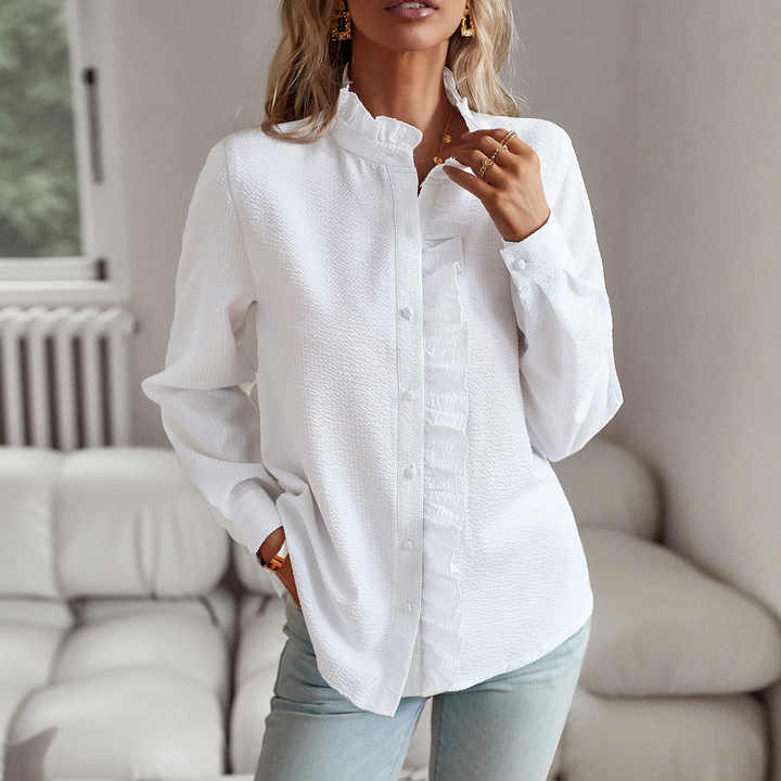 Chic women's ruffled polo top, ideal for a smart casual look and everyday comfort.