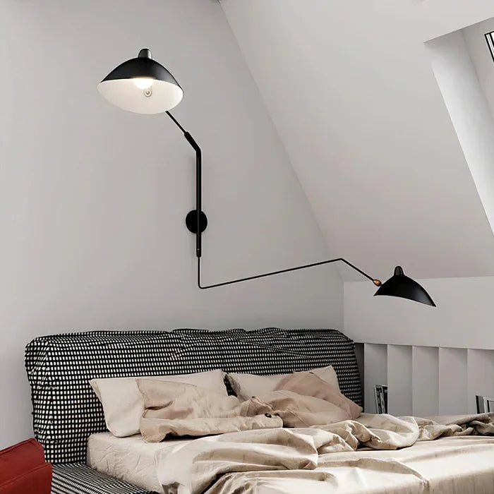 Modern black adjustable wall lamp, ideal reading light & accent for contemporary home decor.