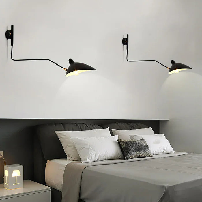 Minimalist black wall lamp, adjustable reading light enhances modern home decor & interior lighting.