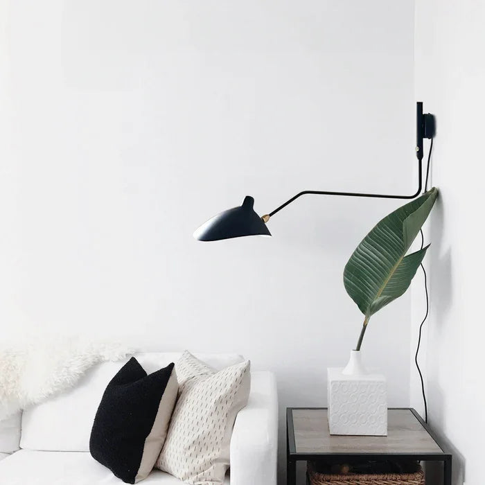 Scandinavian adjustable wall light, provides task lighting for reading & stylish accent decor.