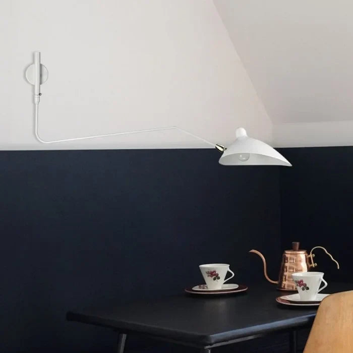 Stylish black wall-mounted lamp, adjustable reading light enhances modern interior design.