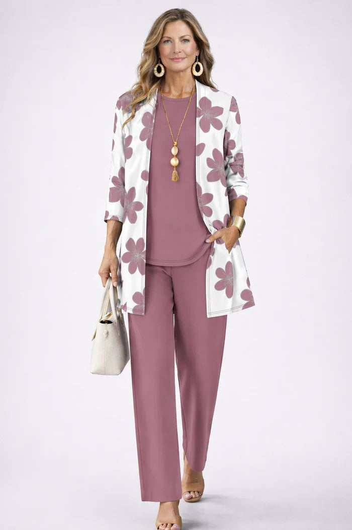 Versatile women's three-piece set. Each piece worn separately: printed pants, sleeveless top, longline jacket.