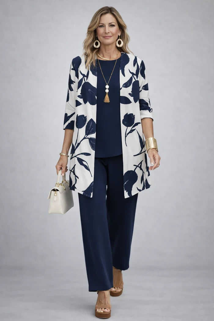 Detail of easy-care fabric on women's stylish printed three-piece set, offering comfort & durability.