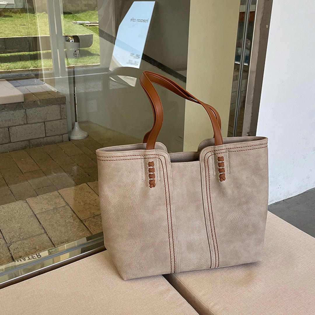 Women's large minimalist vegan leather shoulder tote bag, ideal for daily, work & travel.