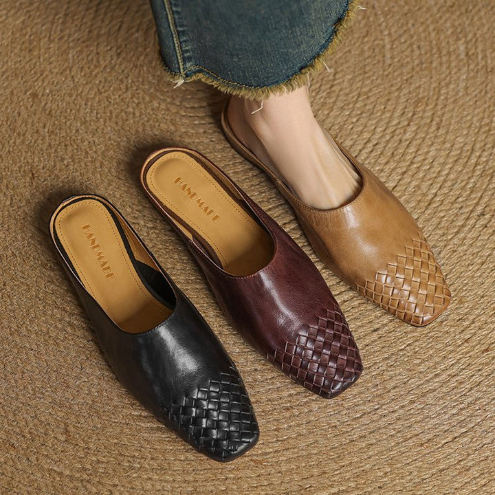 Versatile women's woven mules with a contemporary square toe, ideal for everyday wear.