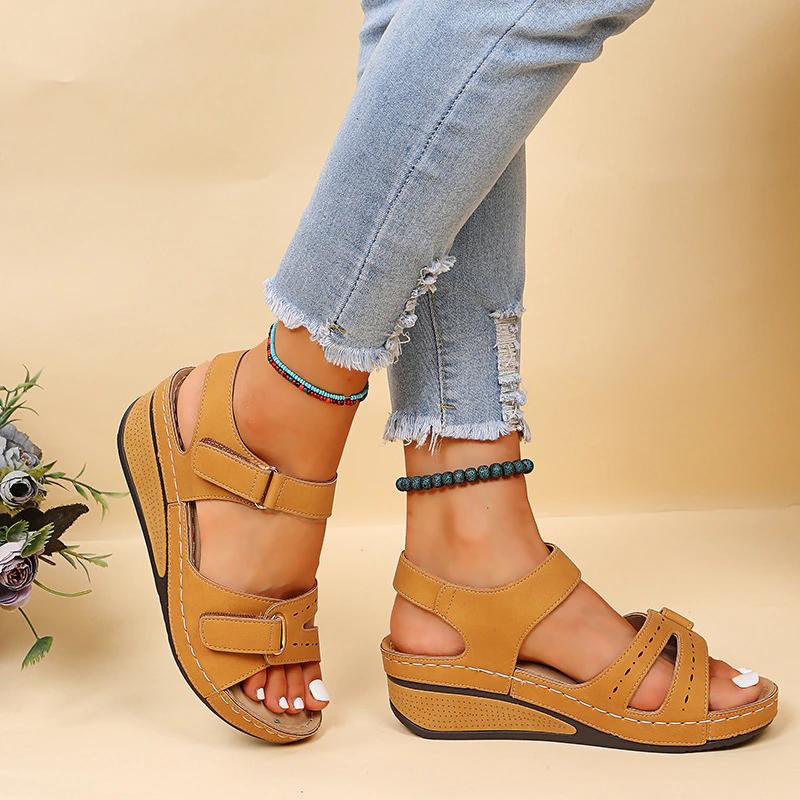 Stylish adjustable orthopedic sandals for women, providing arch support and all-day comfort.