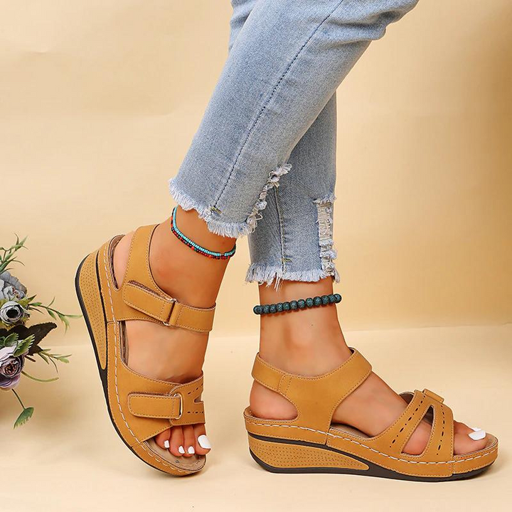 Stylish adjustable orthopedic sandals for women, providing arch support and all-day comfort.