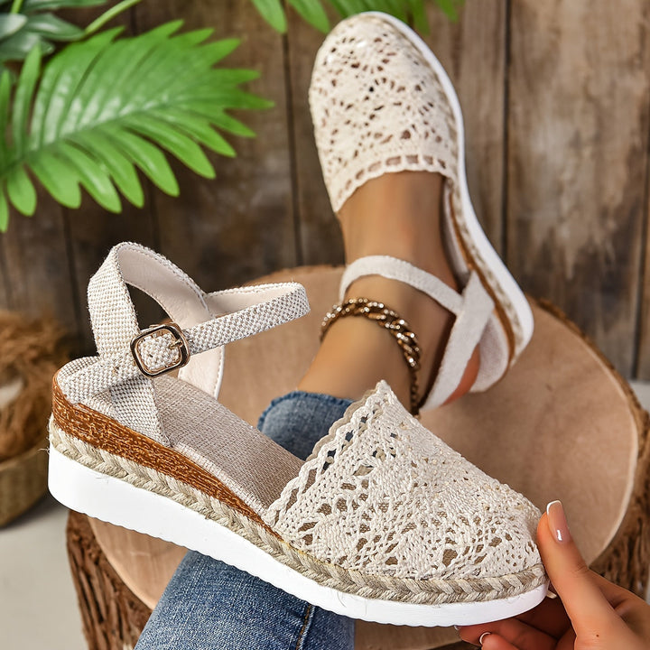 Breathable women's summer sandals featuring essential orthopedic arch and plantar support.