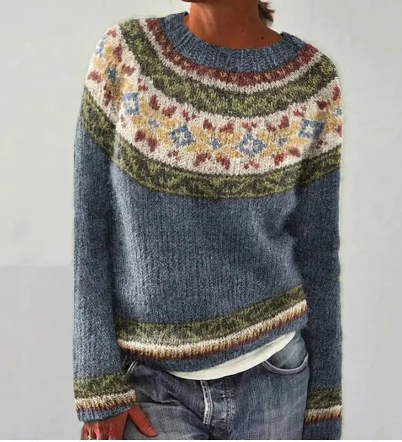 Trendy women's vibrant striped knit sweater, relaxed fit. Colorful retro pullover for comfortable fall fashion.