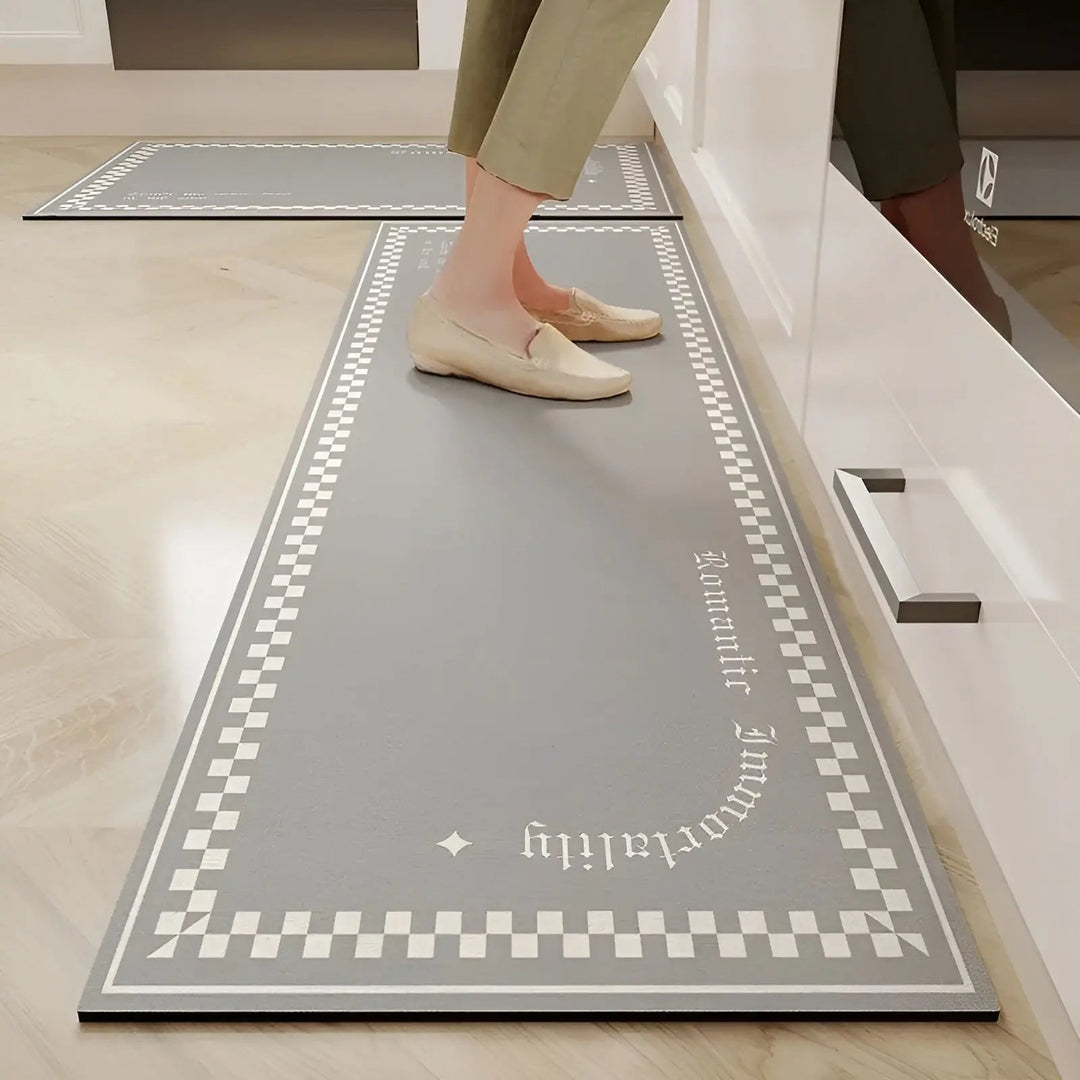 Stylish modern kitchen mat, non-slip & absorbent. Durable PVC floor mat for home decor & comfort.