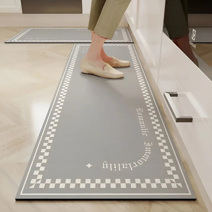 Stylish modern kitchen mat, non-slip & absorbent. Durable PVC floor mat for home decor & comfort.