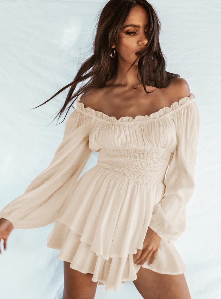 Flowy women's off-shoulder ruffle summer dress. Comfortable short sleeve beachwear, ideal for warm weather.