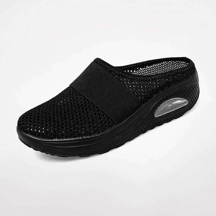 Casual unisex indoor slippers. Lightweight, breathable clogs designed for easy wear, providing lasting comfort and foot support.
