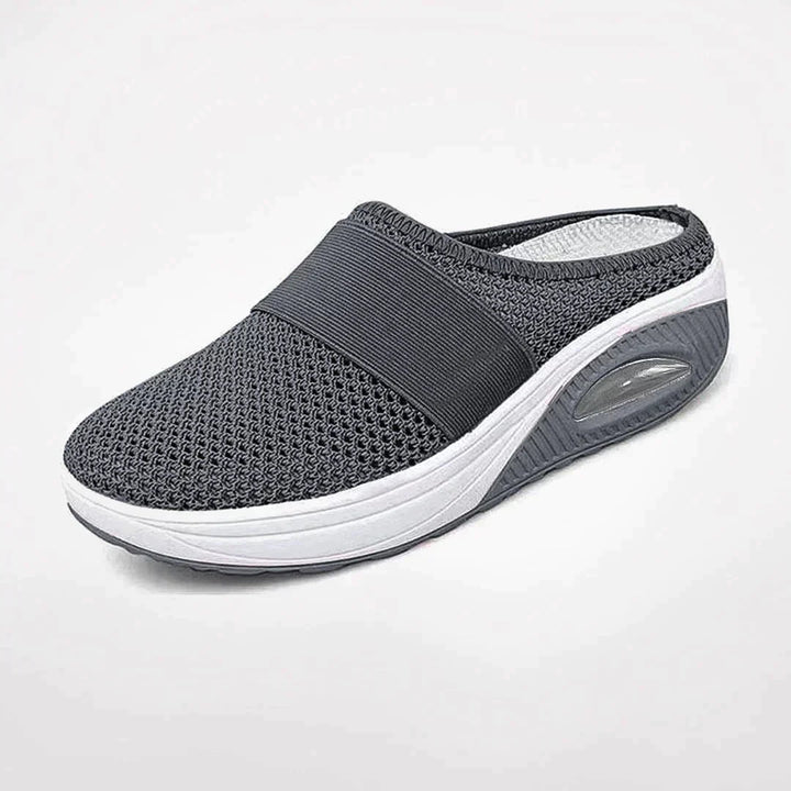 Achieve ultimate foot comfort with these lightweight, breathable unisex clogs. Ideal anti-slip indoor and house slippers.