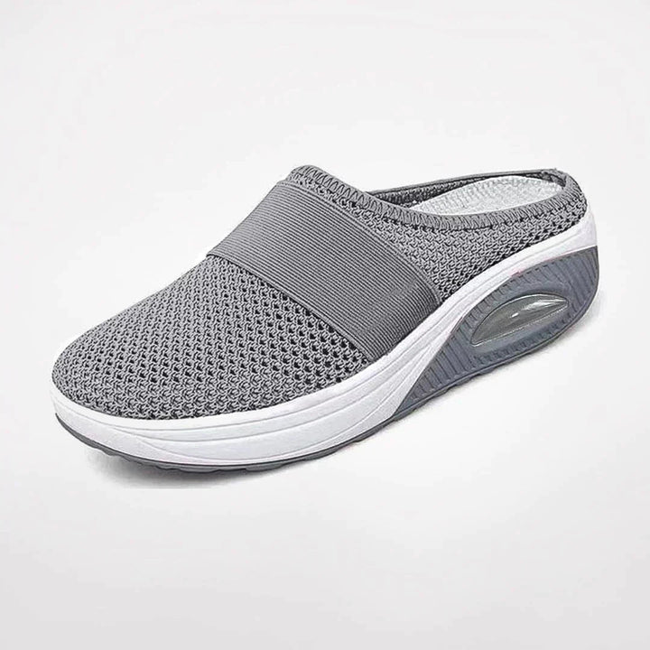 Unisex casual slippers: lightweight, breathable comfort clogs with orthopedic design for all-day foot relaxation and support.