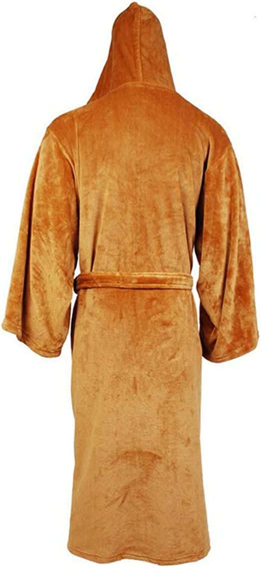Men's long hooded plush bathrobe in a warm, cozy setting. Perfect belted dressing gown for relaxation after bath or lounge.