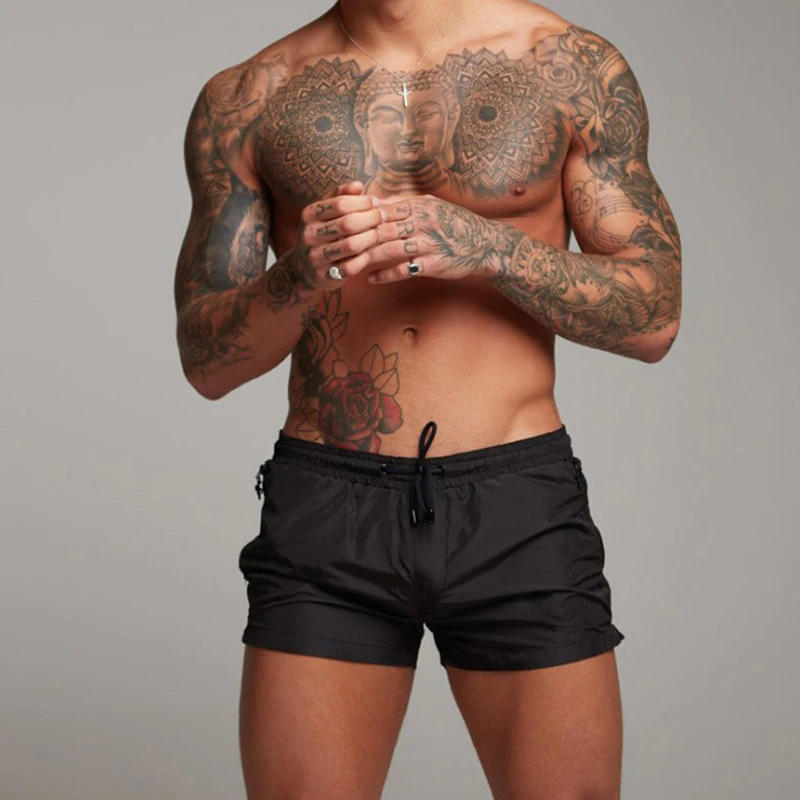 Men's stylish quick-dry swim shorts for beach & pool; comfortable & lightweight swimwear.