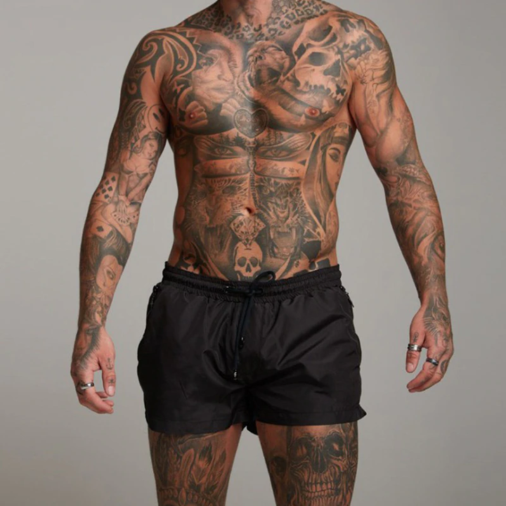 Lightweight men's quick-dry swim shorts with zippered pockets for trendy beach & resort wear.
