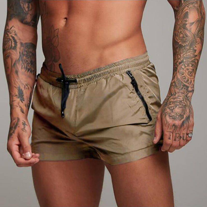 Lightweight men's quick-dry swim shorts, perfect for vacations, beach, or casual summer wear.
