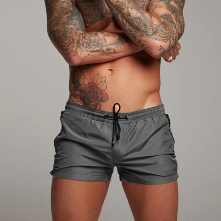 Comfortable & stylish men's quick-dry swim shorts for perfect summer pool & beach days.